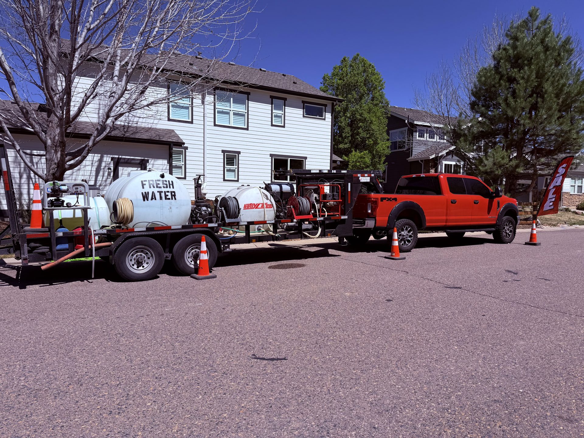 Pressure Pros of Colorado truck and fresh-water trailer on the job
