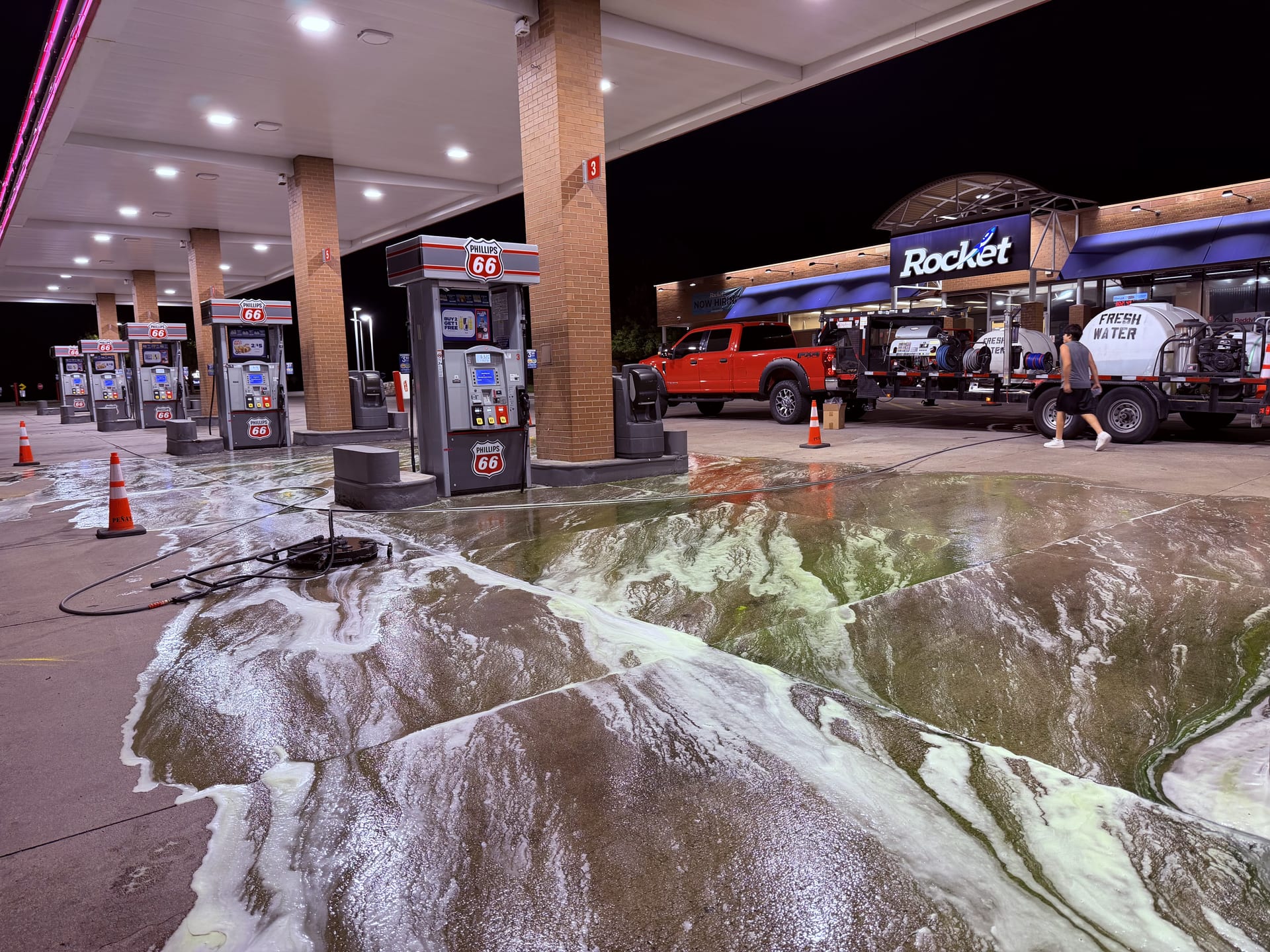 Overnight degreasing of a gas station forecourt